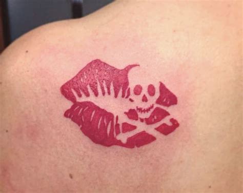 lips on the neck tattoo meaning|kiss of death tattoo.